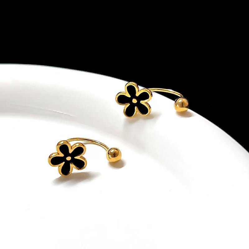 Aretes flor (negro) baño oro 18k