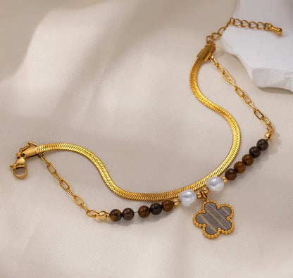 Brazalete flor baño de oro