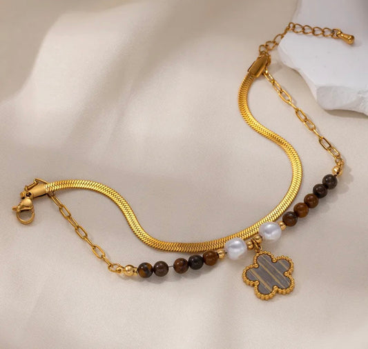 Brazalete flor baño de oro