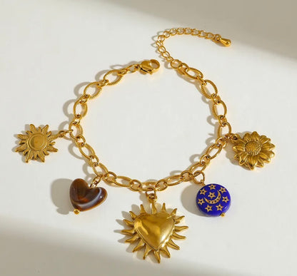 Set sol corazón baño oro 18k.