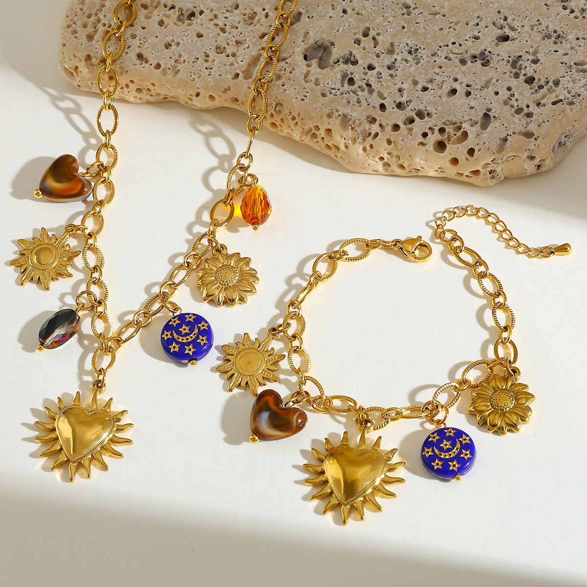 Set sol corazón baño oro 18k.